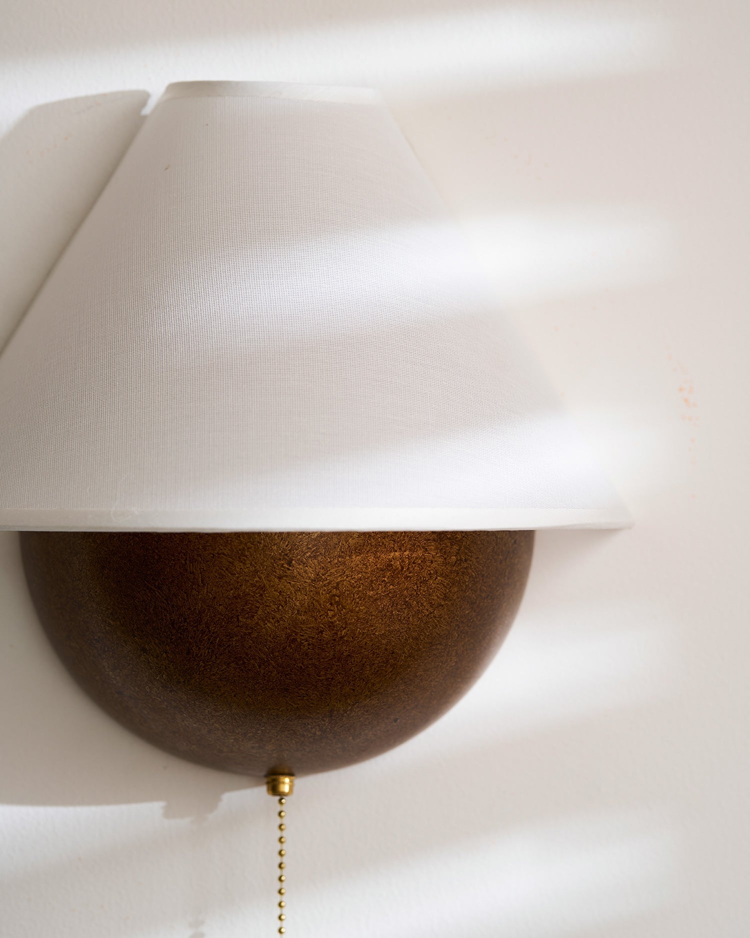 Transitional Travertine Wall Sconce With Warm Dimmable Glow — Harbor Light Co.