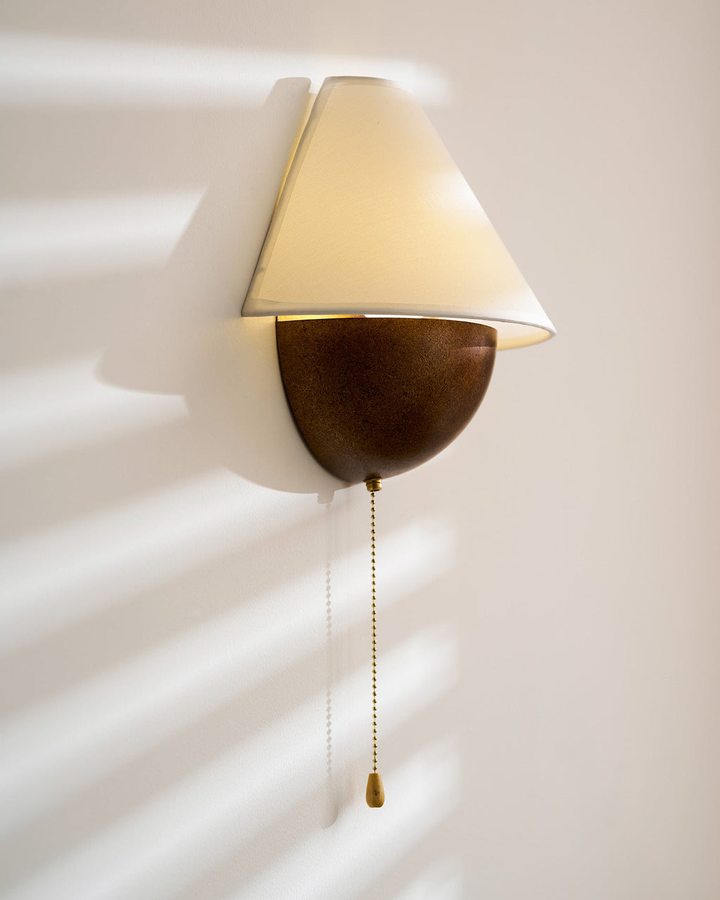 Transitional Travertine Wall Sconce With Warm Dimmable Glow — Harbor Light Co.