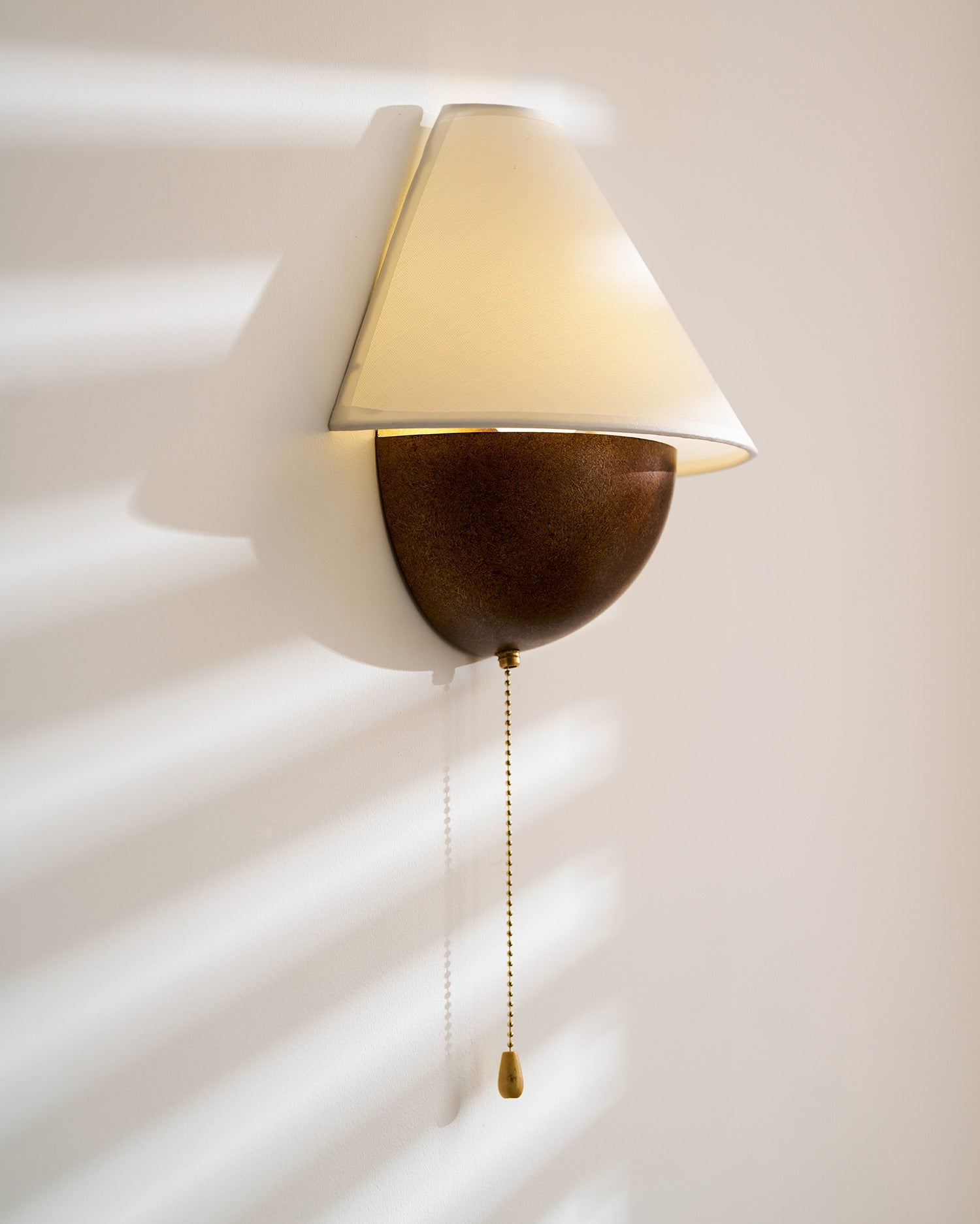 Transitional Travertine Wall Sconce With Warm Dimmable Glow — Harbor Light Co.