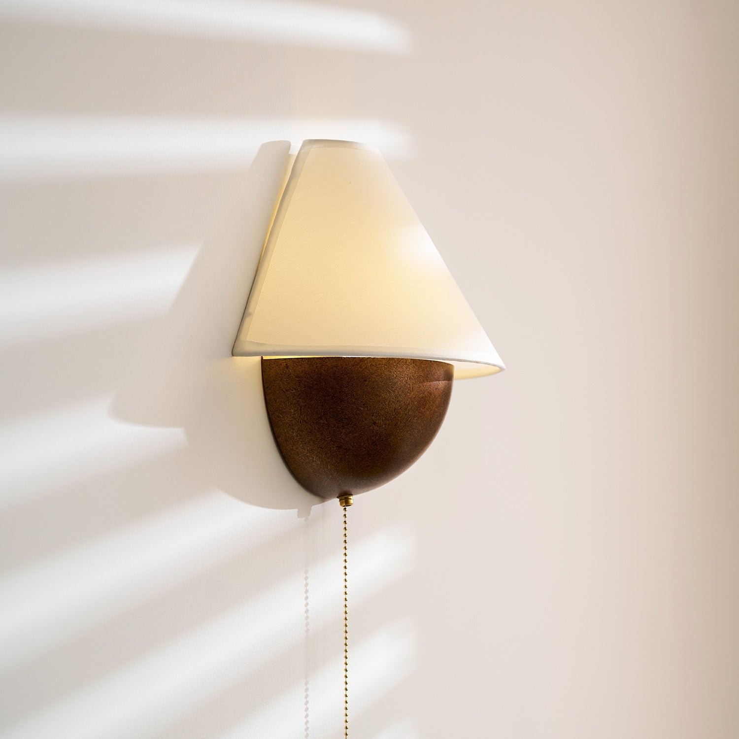 Transitional Travertine Wall Sconce With Warm Dimmable Glow — Harbor Light Co.