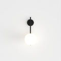 Modern Globe Wall Sconce with Slim Stem and Round Backplate