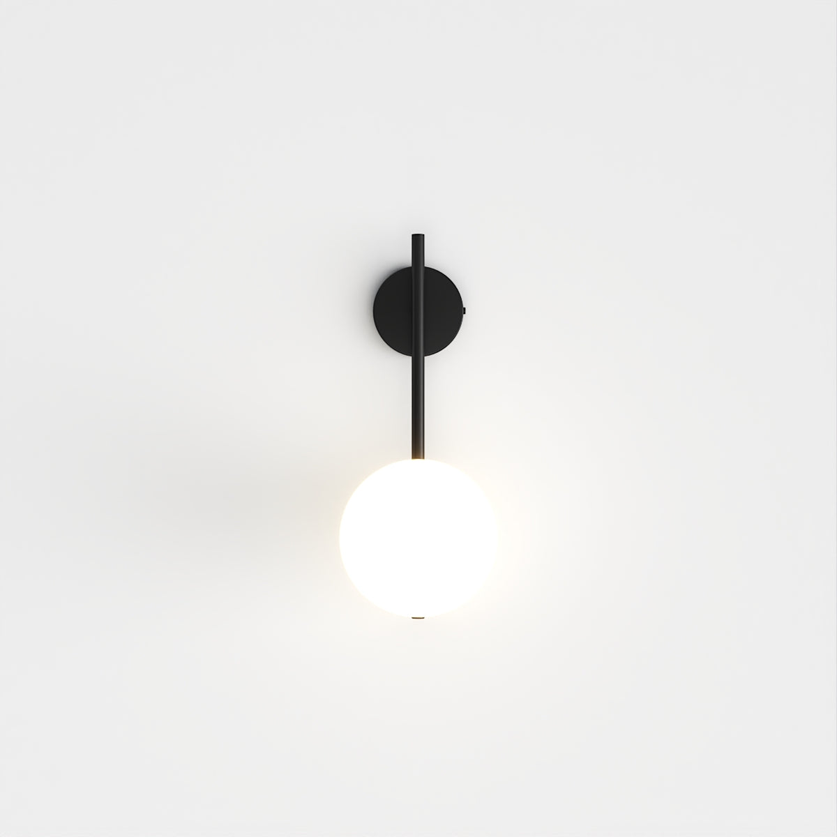 Modern Globe Wall Sconce with Slim Stem and Round Backplate