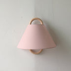 Modern Wood Wall Sconce With Warm LED Glow in Light Pink - Flat — Harbor Light Co.