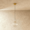 Glass Globe Pendant Light with Brass Ceiling Canopy