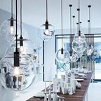 Clear Glass Globe Pendant Light with Metal Disc Canopy and Adjustable Cord