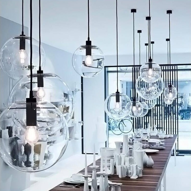Clear Glass Globe Pendant Light with Metal Disc Canopy and Adjustable Cord