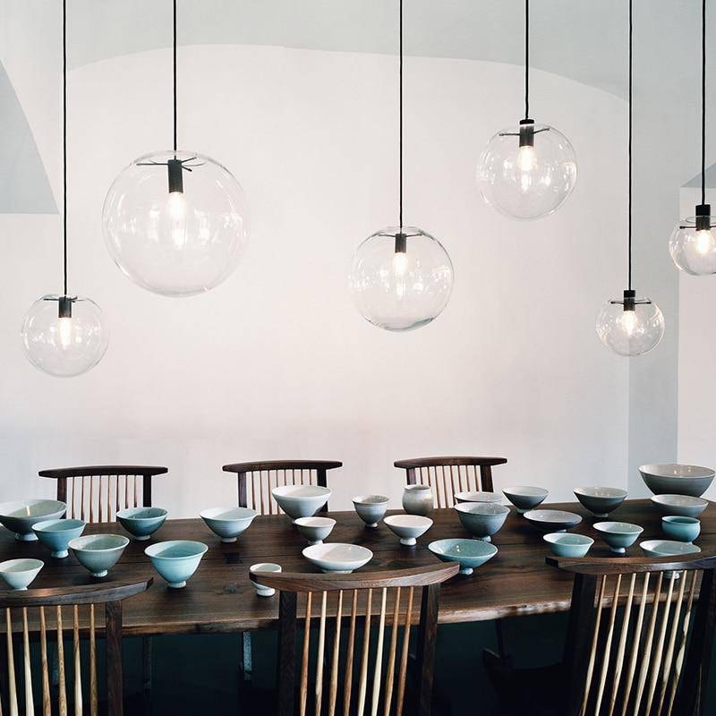 Clear Glass Globe Pendant Light with Metal Disc Canopy and Adjustable Cord