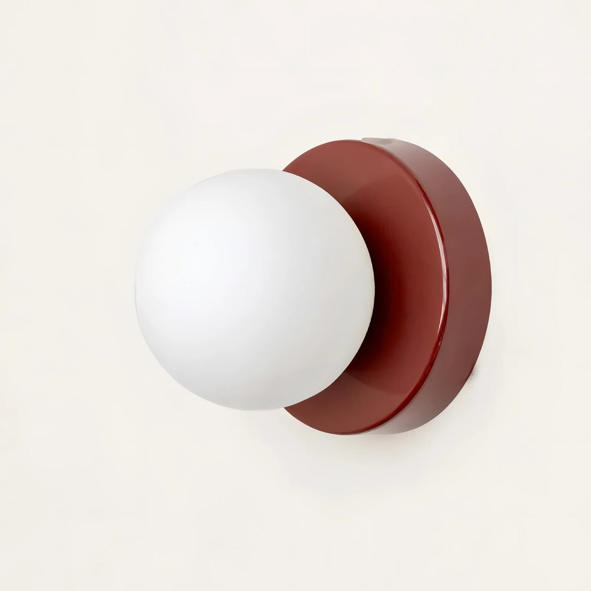 Minimalist Globe Wall Sconce with Opal Glass Shade and Metal Base
