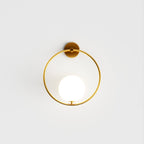 Modern Globe Wall Sconce with Slim Stem and Round Backplate