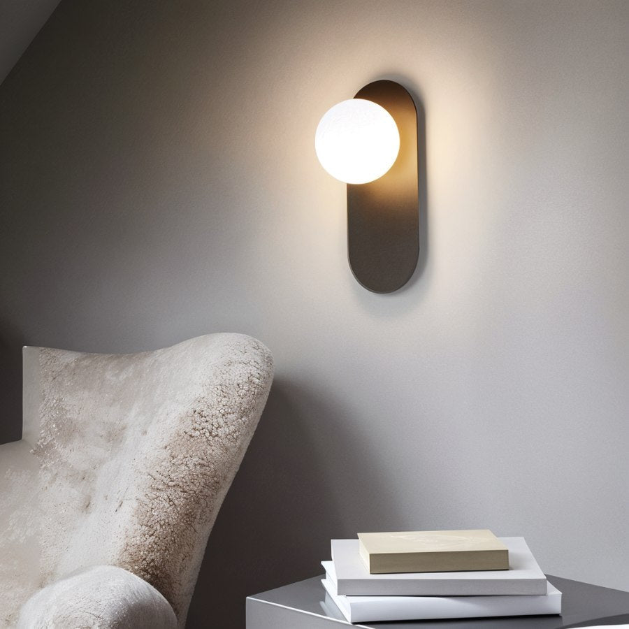 Modern Globe Wall Sconce with Slim Stem and Round Backplate