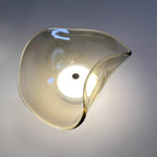 Sculpted Curved Glass Wall Sconce with Up and Down Glow
