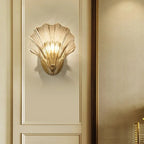 Seashell Wall Sconce with Clear Ribbed Shell Shade and Brass Finish Arm