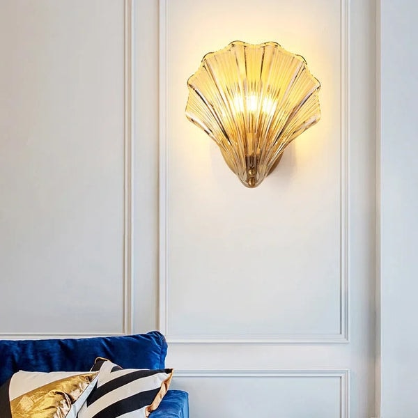 Seashell Wall Sconce with Clear Ribbed Shell Shade and Brass Finish Arm