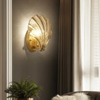 Seashell Wall Sconce with Clear Ribbed Shell Shade and Brass Finish Arm