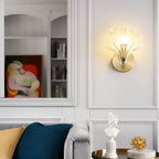 Seashell Wall Sconce with Clear Ribbed Shell Shade and Brass Finish Arm