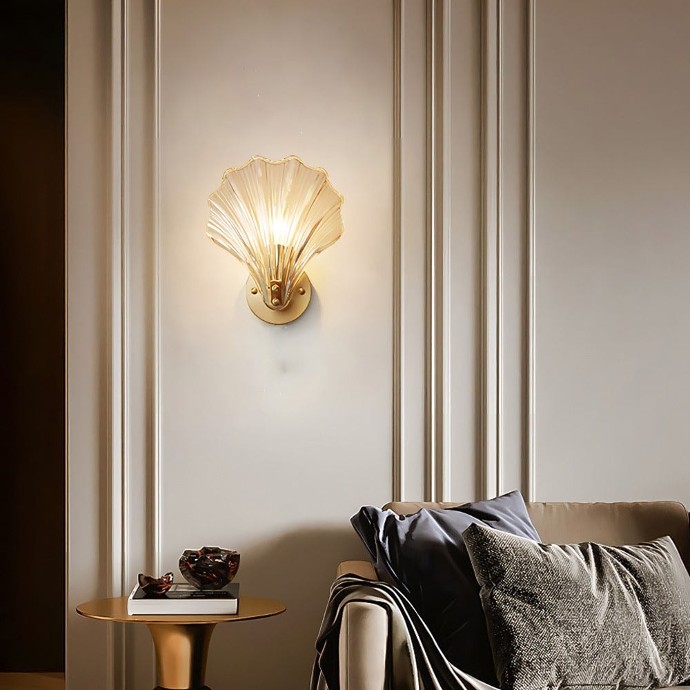 Seashell Wall Sconce with Clear Ribbed Shell Shade and Brass Finish Arm