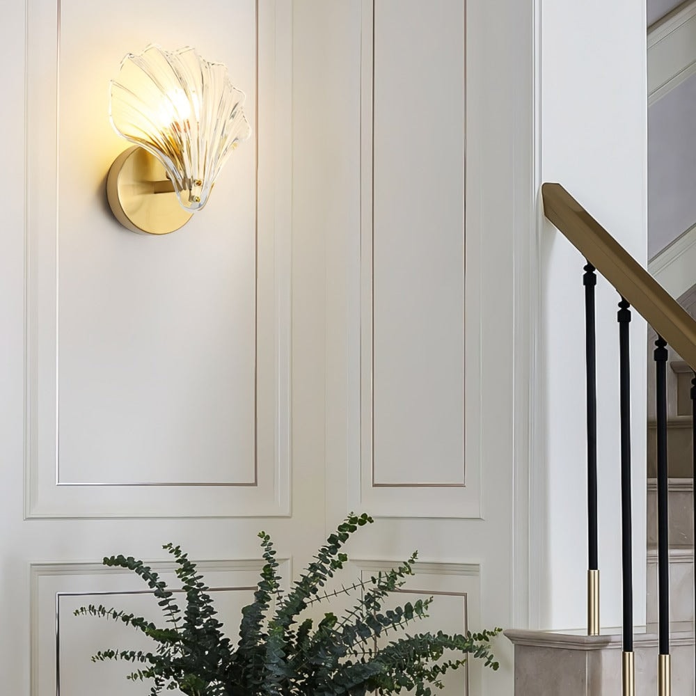 Seashell Wall Sconce with Clear Ribbed Shell Shade and Brass Finish Arm