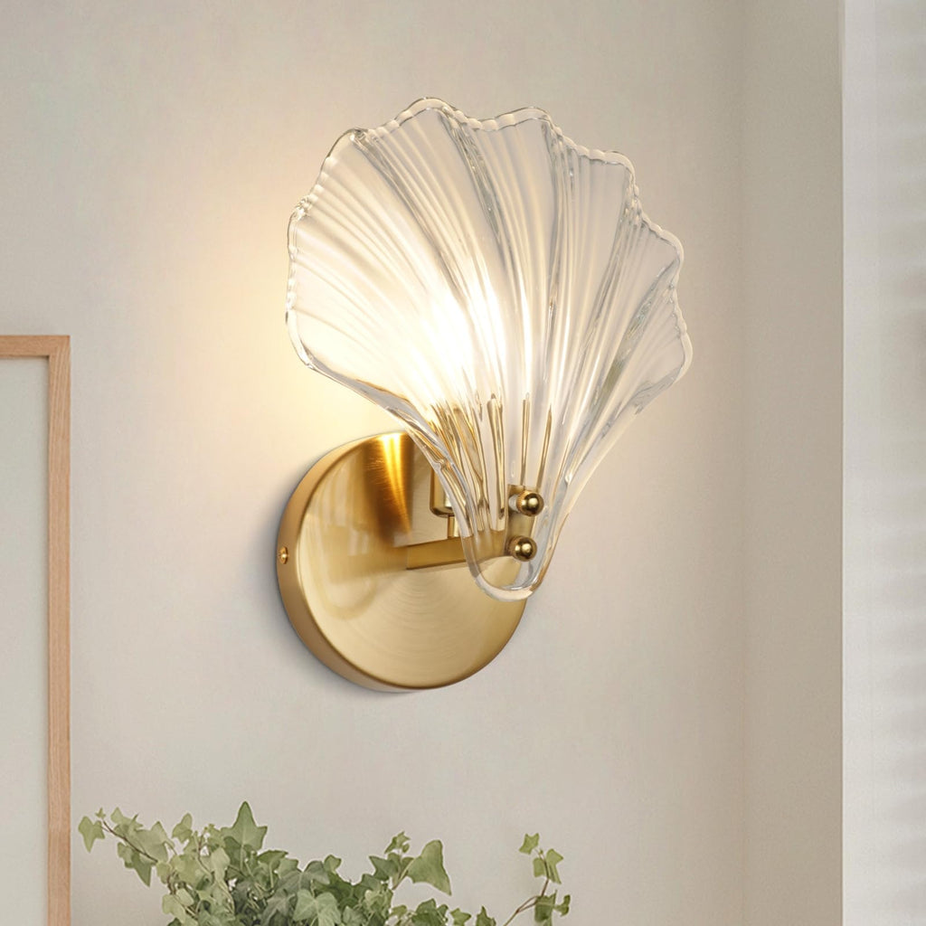 Seashell Wall Sconce with Clear Ribbed Shell Shade and Brass Finish Arm