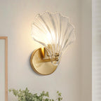 Seashell Wall Sconce with Clear Ribbed Shell Shade and Brass Finish Arm
